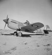 Asisbiz Curtiss P 40E Kittyhawk RAF 94Sqn AK596 Western Desert Feb 1942 IWM CM2008