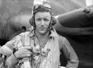 Asisbiz Aircrew RNZAF 14Sqn Flying Officer RA Weber with his Kittyhawk at Guadalcanal 02
