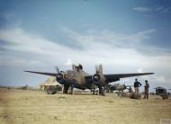 Asisbiz Douglas Boston SAAF 24Sqn S Sugar running up its engines on an airfield in the North African desert IWM TR856