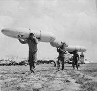 Asisbiz 42 25846 P 47D Thunderbolt 9AF 50FG81FS 2NJ with ground crew with 108 gallon gas tanks 25th July 1944 01