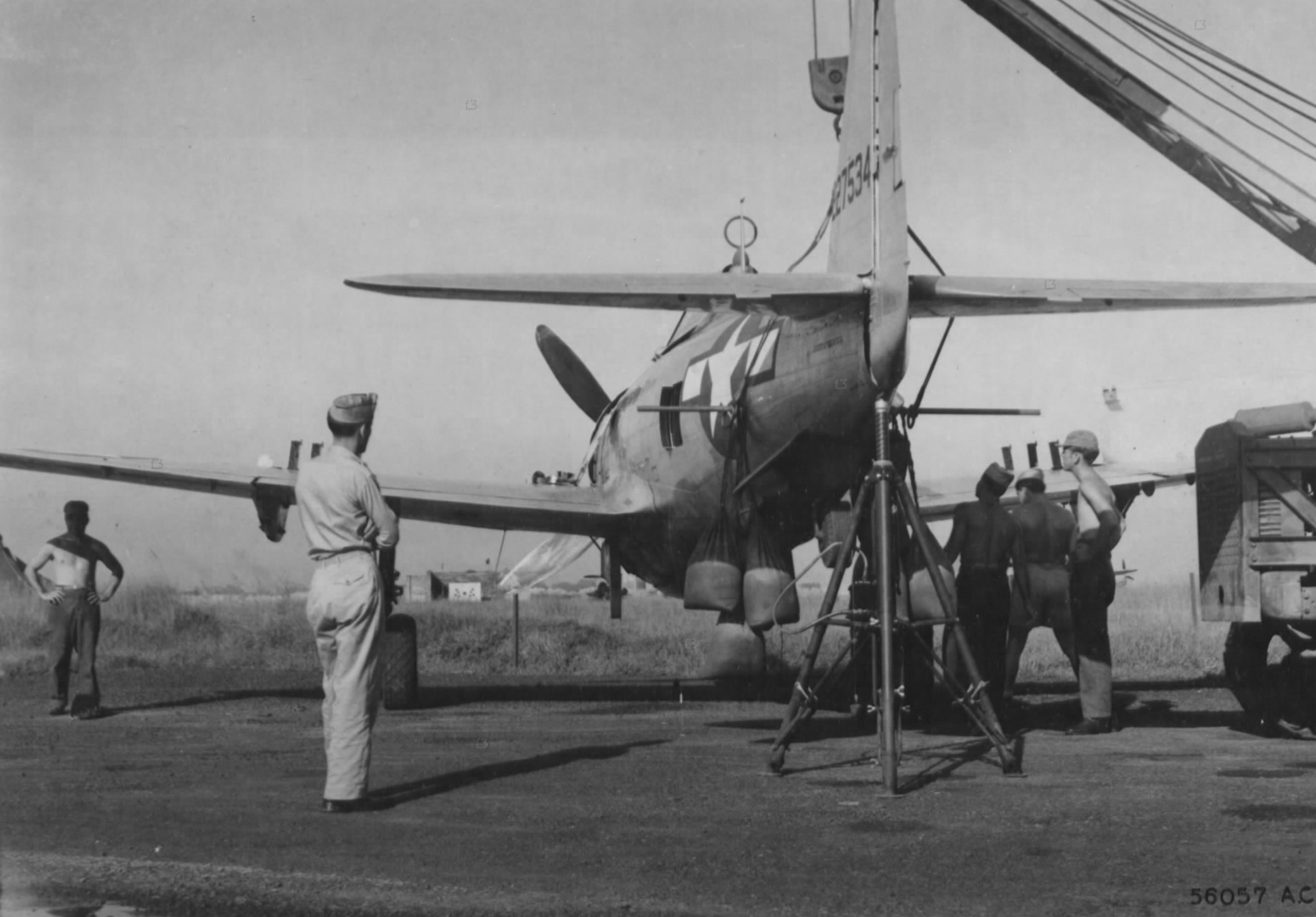 Asisbiz 42-27534 P-47D Thunderbolt 1ACG is hoisted into bore sighting ...