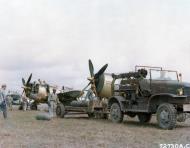 Asisbiz 1st Air Commando Group P 47D Thunderbolts being armed with 500lb bombs in India 10th Feb 1945 NA447