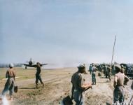 Asisbiz USAAF Republic P 47D Thunderbolt lands on the recently captured field at Thabutkan Burma Feb 1945 NA191