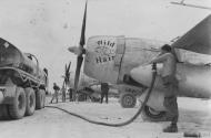 Asisbiz USAAF Republic P 47D Thunderbolt 15AF 325FBG381FS named Wild Hair being refueled FRE9145