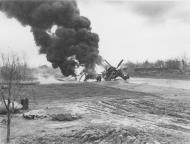 Asisbiz USAAF Republic P 47D Thunderbolt 9AF 48FG burns on the runway 01