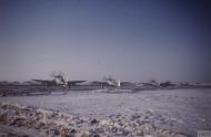 Asisbiz USAAF Republic P 47D Thunderbolts 9AF 48FG493FS I7 line up for take off in Germany 16th Jan 1945 FRE7044