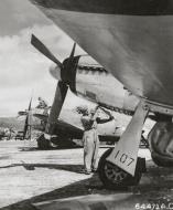 Asisbiz 43 25269 P 47D Thunderbolt 7AF 318FG18FS Miss Carol Ann under going maintenance Saipan Feb 1945 02