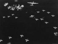 Asisbiz B 29 Superfortress helps navigate P 51D Mustangs on a strafing mission to Tokyo Japan 1945 01