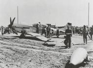 Asisbiz 44 63464 P 51D Mustang 7AF 15FG47FS 163 Lt RJ Betner landing mishap at Iwo Jima 6th Mar 1945 01