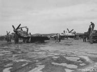 Asisbiz 44 63474 P 51D Mustang 7AF 15FG45FS 86 Foxy hit by another landing P 51 Iwo Jima 10th Mar 1945 03