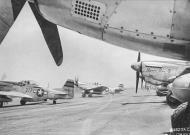 Asisbiz 44 63957 P 51D Mustang 7AF 21FG46FS taxiing at Iwo Jima Mar 1945 01