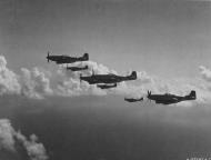 Asisbiz P 51D Mustang 7AF 15FG fighters being sheparded by a Boeing B 29 Superfortresses to Japan 1945 01