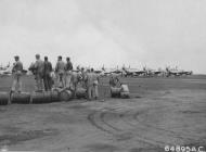 Asisbiz P 51D Mustang 7AF 15FG preparing to leave on a mission to Tokyo at Iwo Jima 21st Apr 1945 01