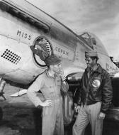 Asisbiz P 51D Mustang 7AF 15FG45FS Miss Cordie Capt Francis L Ennis (L) 1LT Alvan E Roberts at Iwo Jima 12th Apr 1945 01