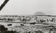 Asisbiz P 51D Mustang 7AF 15FG47FS lined up with P 61A Black Widows at Iwo Jima 1945 01