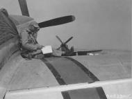 Asisbiz P 51D Mustang 7AF 15SF ground crew fills out a maintenance log Iwo Jima Bonin Islands 01