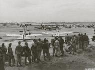 Asisbiz P 51D Mustang 7AF 21FG72FS at the dispersal area at Iwo Jima 1945 01