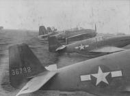 Asisbiz 43 6798 and 43 6985 P 51B Mustangs with RN Fleet Air Arm Grumman Avenger at a US assembly depot field in England 01