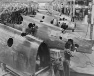 Asisbiz North American Aviation's P 51 fuselage overhead conveyor line at Inglewood California Oct 1942 01