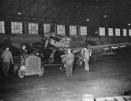 Asisbiz P 51 Mustangs are moved for reassembly at the Lockheed Reassembly Plant at Liverpool England 7th Dec 1943 01