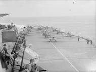 Asisbiz Fleet Air Arm 887NAS n 894NAS Seafires aboard HMS Indefatigable with HMS Jamaica Aug 1944 IWM A25081