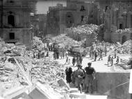 Asisbiz Heavily bomb damaged street in Valletta Malta 1st May 1942 01