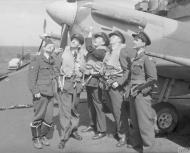 Asisbiz Pedestal Spitfire pilots from Eagle Squadron aboard HMS Eagle head to Malta 19 23rd Mar 1942 IWM A9582