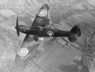 Asisbiz Spitfire 1 Prototype K5054 in flight over England 1939 IWM HU1660