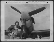 Asisbiz Spitfire MkVb RAF 121Sqn AVR BM590 Capt Don Willis stands beside his aircraft England July 1942 NA1877