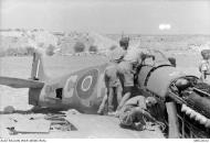 Asisbiz Spitfire IX RAF 154Sqn HTC EN356 being salvaged Malta Jul 1943 AWM MEC2032