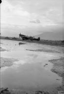 Asisbiz Spitfire MkVcTrop RAF 43Sqn EF682 waterlogged airfield at Capodichino near Naples Italy IWM CNA2039