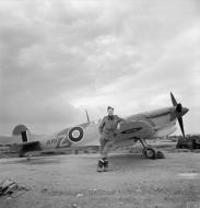 Asisbiz Spitfire MkVcTrop RAF 43Sqn FTZ JK101 with Sqn Ldr M Rook at Jemappes Algeria IWM CNA356