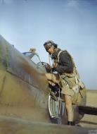 Asisbiz Aircrew RCAF 417Sqn pilot about to embark on a mission Goubrine Tunisia April 1943 IWM TR832