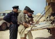 Asisbiz Aircrew RCAF 417Sqn pilots planning another mission Goubrine airfield Tunisia April 1943 IWM TR829