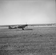 Asisbiz Spitfire MkVII c wing RCAF 417 ANH JF703 taking off at Canne Italy IWM CNA278