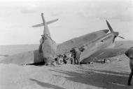 Asisbiz Spitfire MkVb SAAF 1Sqn AXA EP690 landing accident El Hasseiat 4th Dec 1942 02