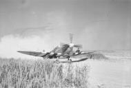 Asisbiz Spitfire MkIX taxing at B2 Bazenville Normandy 1944 IWM CL182A