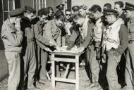 Asisbiz Aircrew USAAF 12AF 52FG during a pre mission briefing England Oct 1942 IWM FRE11148