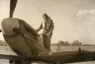 Asisbiz Aircrew USAAF 52FG Lt John Aitken on the wing of his Spitfire 24th Oct 1942 IWM FRE11149