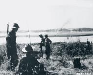 Asisbiz British and American Airbourne troops cross the Irrawaddy river during the battle for Meiktila Feb 1945 NA161