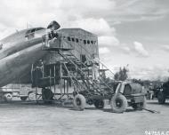 Asisbiz Curtiss C 46 Commando ATC 1333 AAF Base Unit under going repairs at Assam India 7th May 1945 NA214