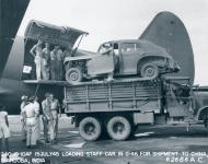 Asisbiz Curtiss C 46A Commando being loaded with a staff car for China at Piardoba India 15th Jul 1945 NA502