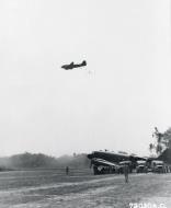 Asisbiz Douglas C 47 Dakota 1st n 2TCS drop food to troops fighting near by Taihpa Burma 5th March 1944 NA495