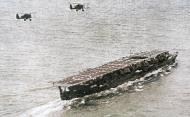 Asisbiz Imperial Japanese Navy aircraft carrier Ryujo with a pair of Aichi D1A2 dive bombers overhead 1930s 01