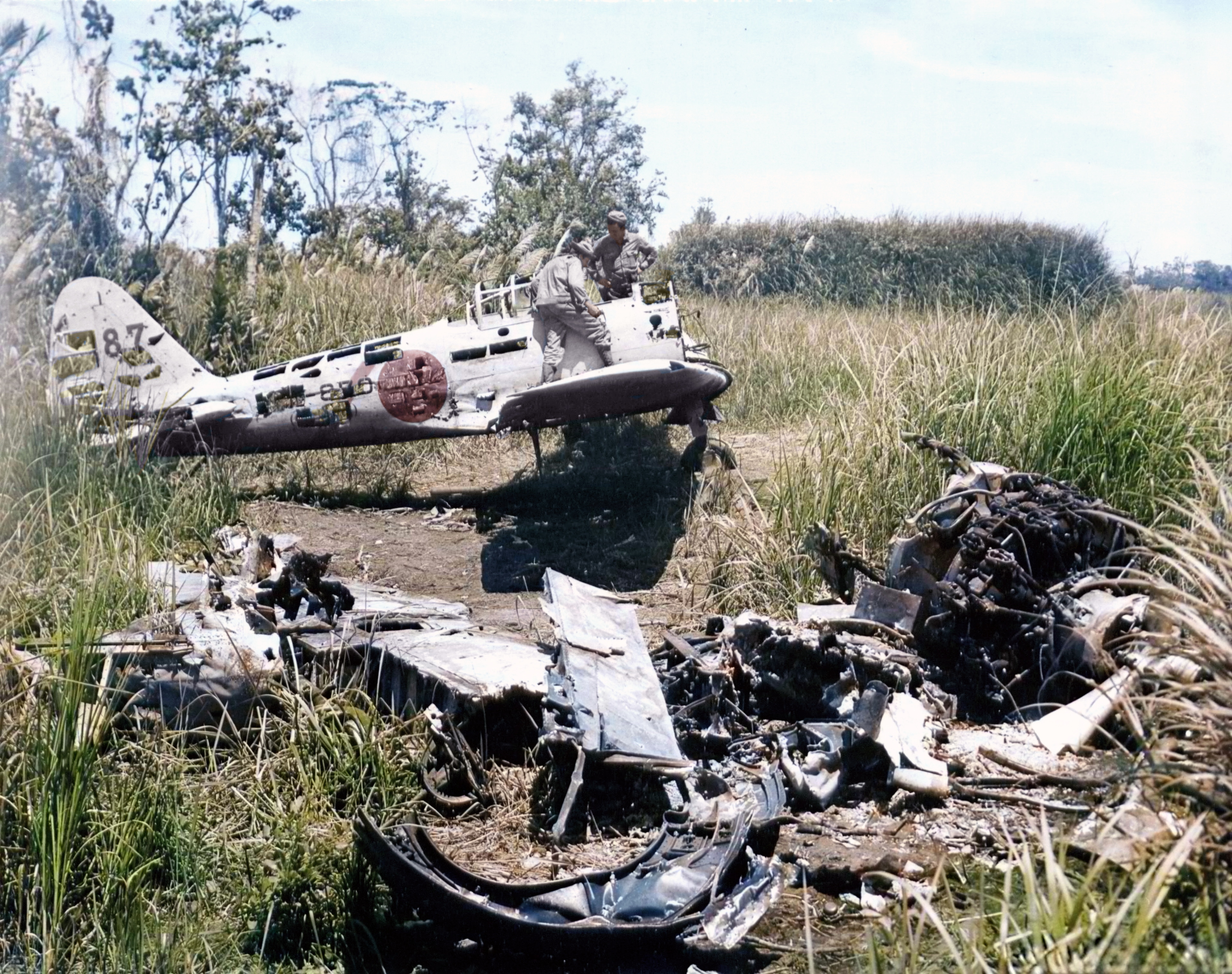 Japanese Zero destroyed by bombing at Buna Papua New Guinea inspected by 41st Division Mar 1943