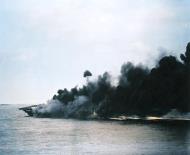 Asisbiz USS Hancock (CV 19) pictured after being hit by a kamikaze aircraft off Okinawa 7th Apr 1945 05