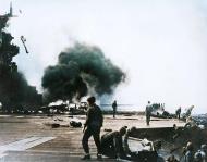 Asisbiz USS Hancock (CV 19) pictured after being hit by a kamikaze aircraft off Okinawa 7th Apr 1945 06