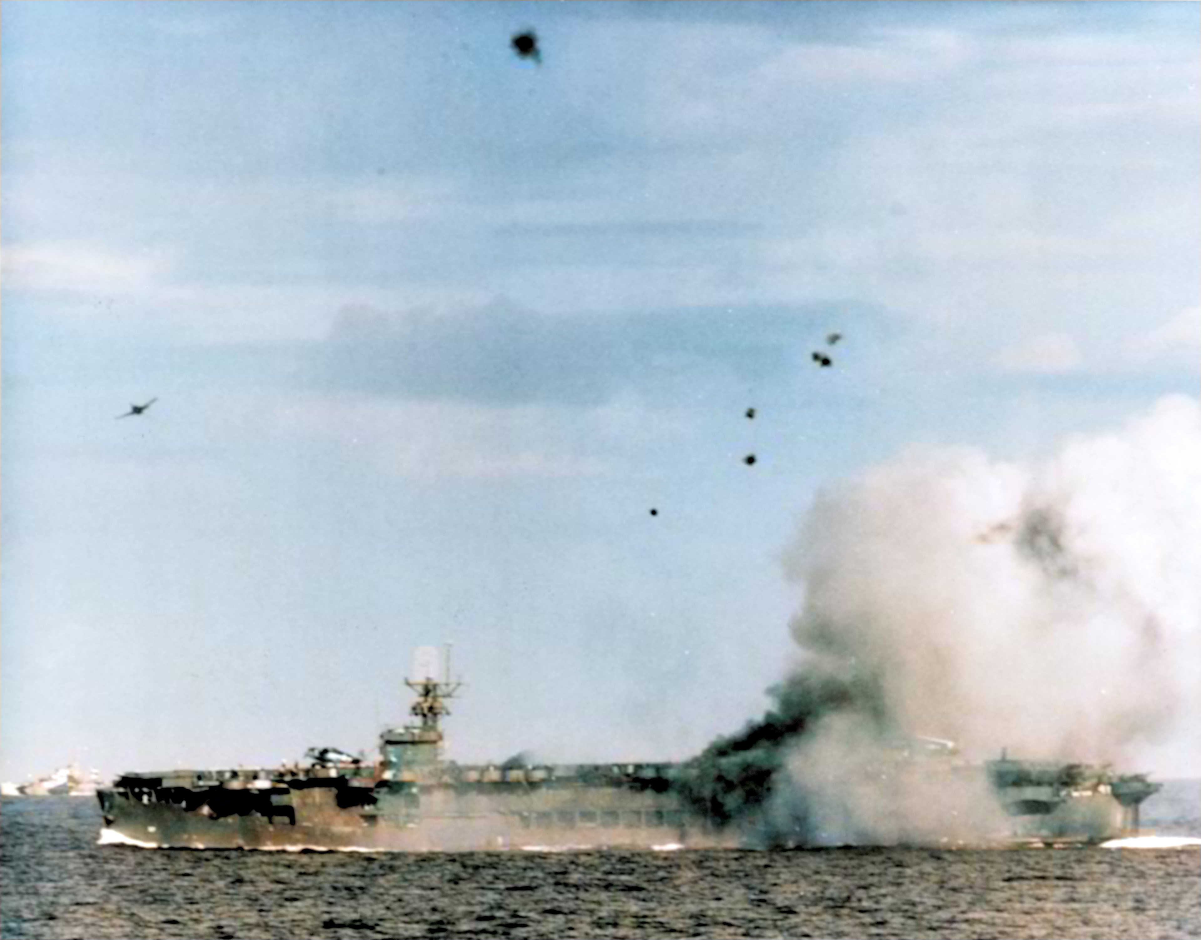 Grumman F6F Hellcat pulls out after chasing Zeke which crashed into USS Suwannee (CVE 27) Leyte Gulf 25th Oct 1944 NH 71524