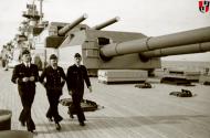 Asisbiz Kriegsmarine battleship KMS Tirpitz officers walk the deck en route to Norway Riksarkivet