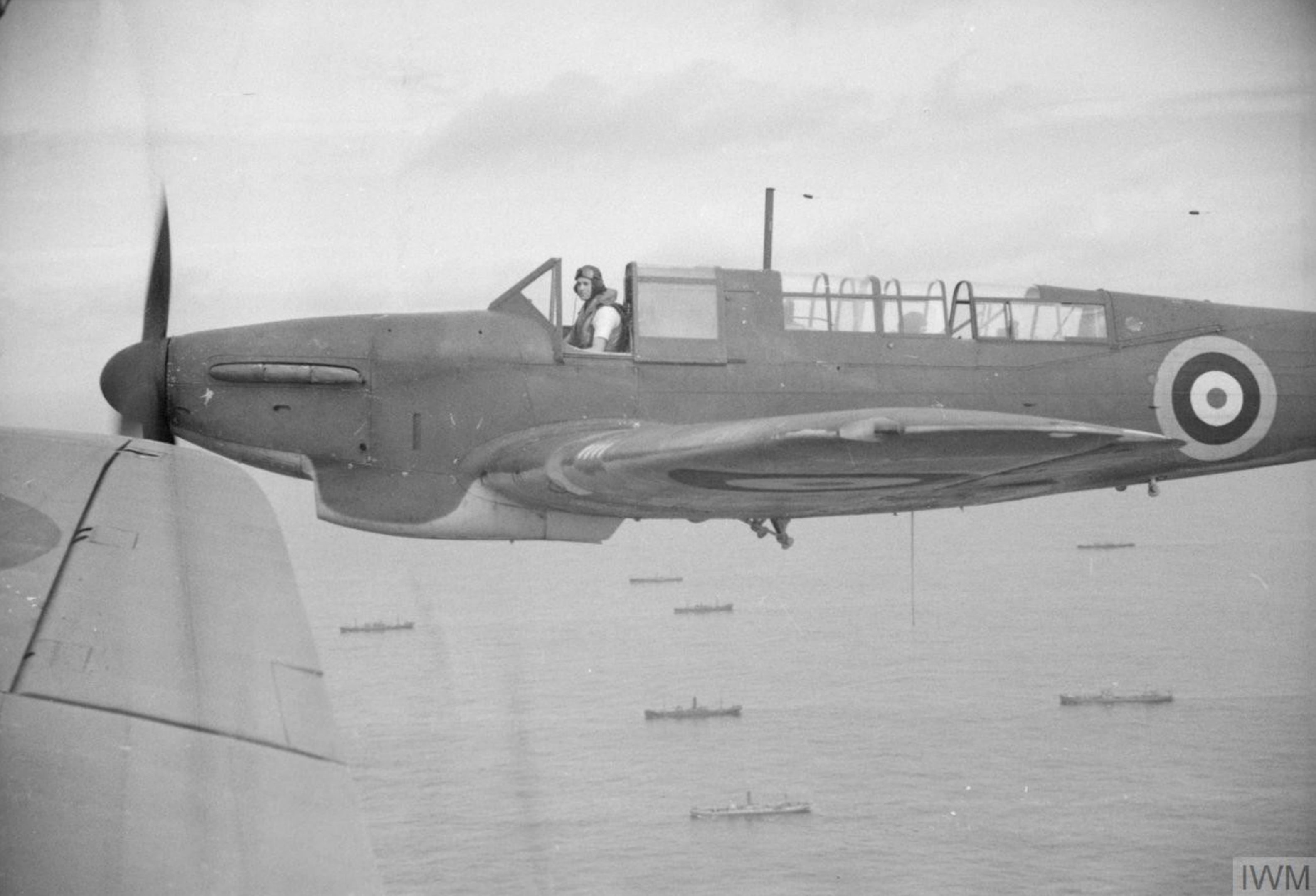 Asisbiz Fleet Air Arm Fairey Fulmar aircraft patrolling over a convoy ...